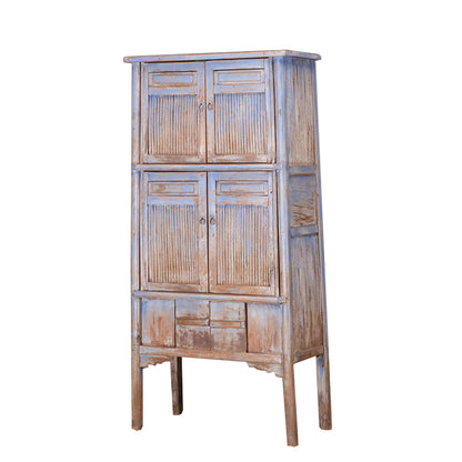 Light blue wooden tall cabinet with bamboo panels