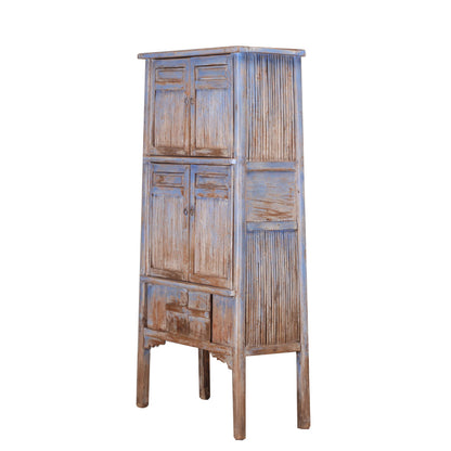 Light blue wooden tall cabinet with bamboo panels