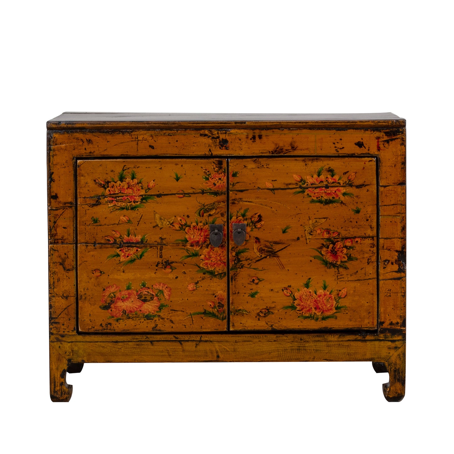 Vintage orange wooden cabinet with floral patterns on a white background