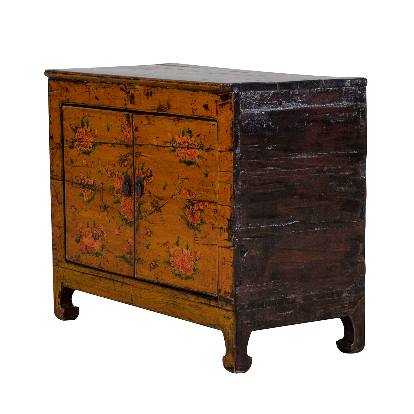 Vintage orange wooden cabinet with floral designs on a white background
