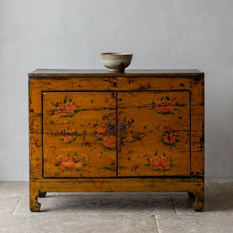 small vintage cabinet in orange with painted flowers