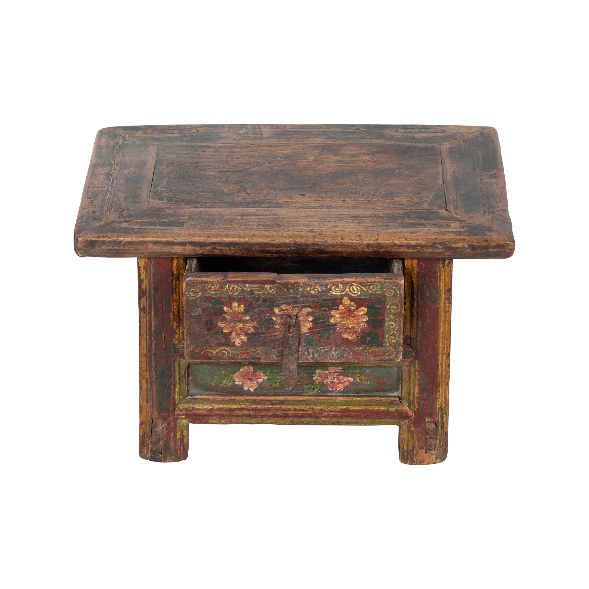 Vintage wooden stool with decorative carvings on a white background