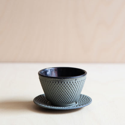 Green Grey Cast Iron teacup and saucer