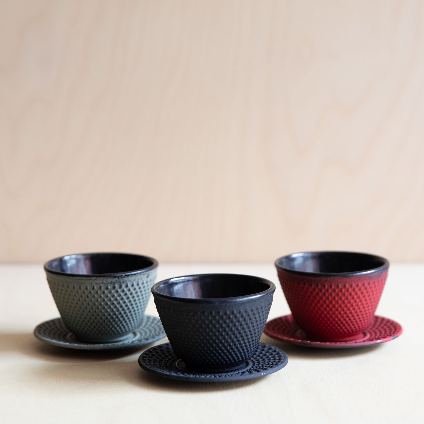 Red Cast Iron teacup and saucer