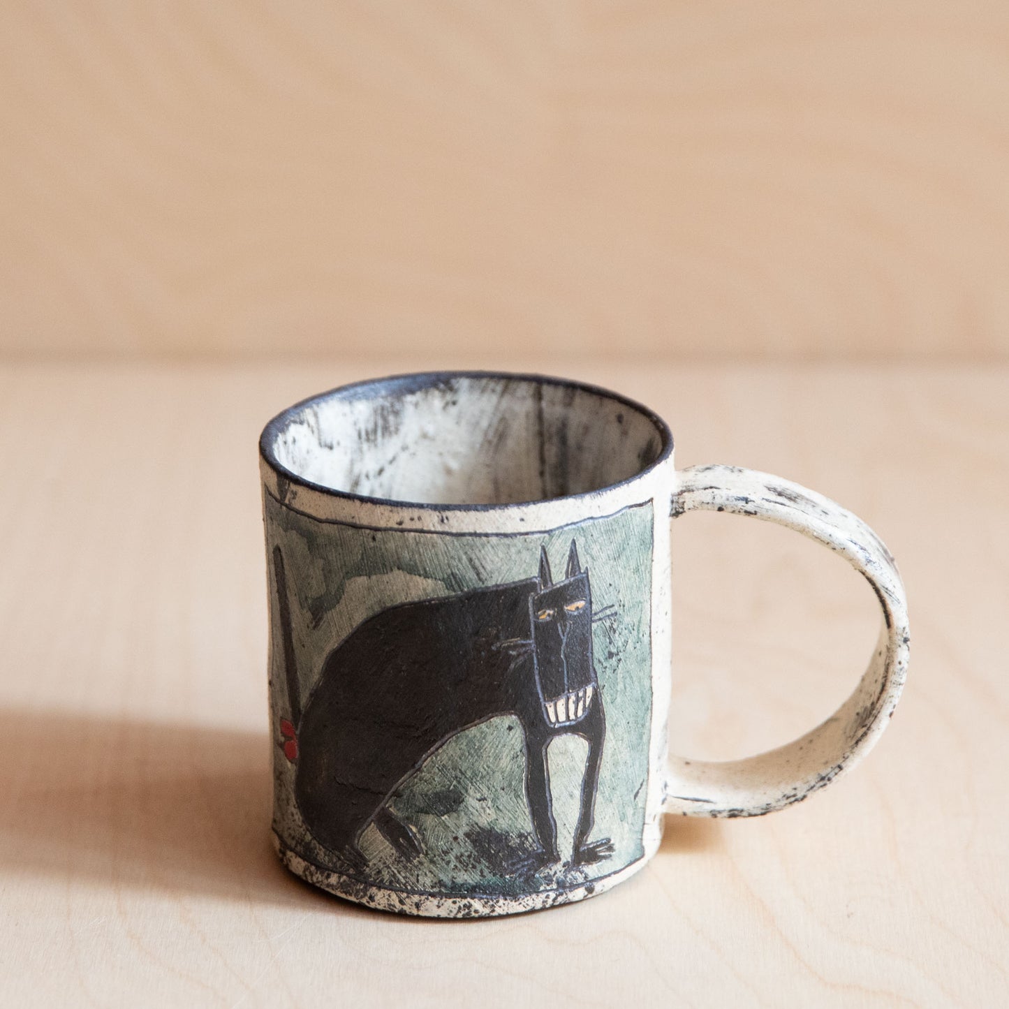 Black Cat with Teeth Ceramic Mug
