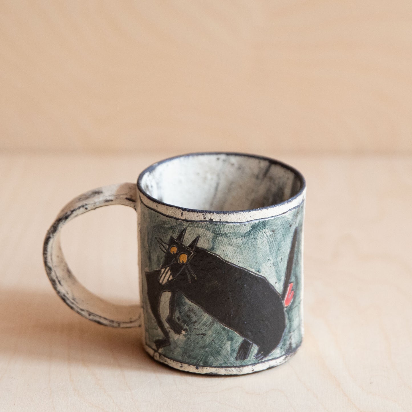 Black Cat with Teeth Ceramic Mug