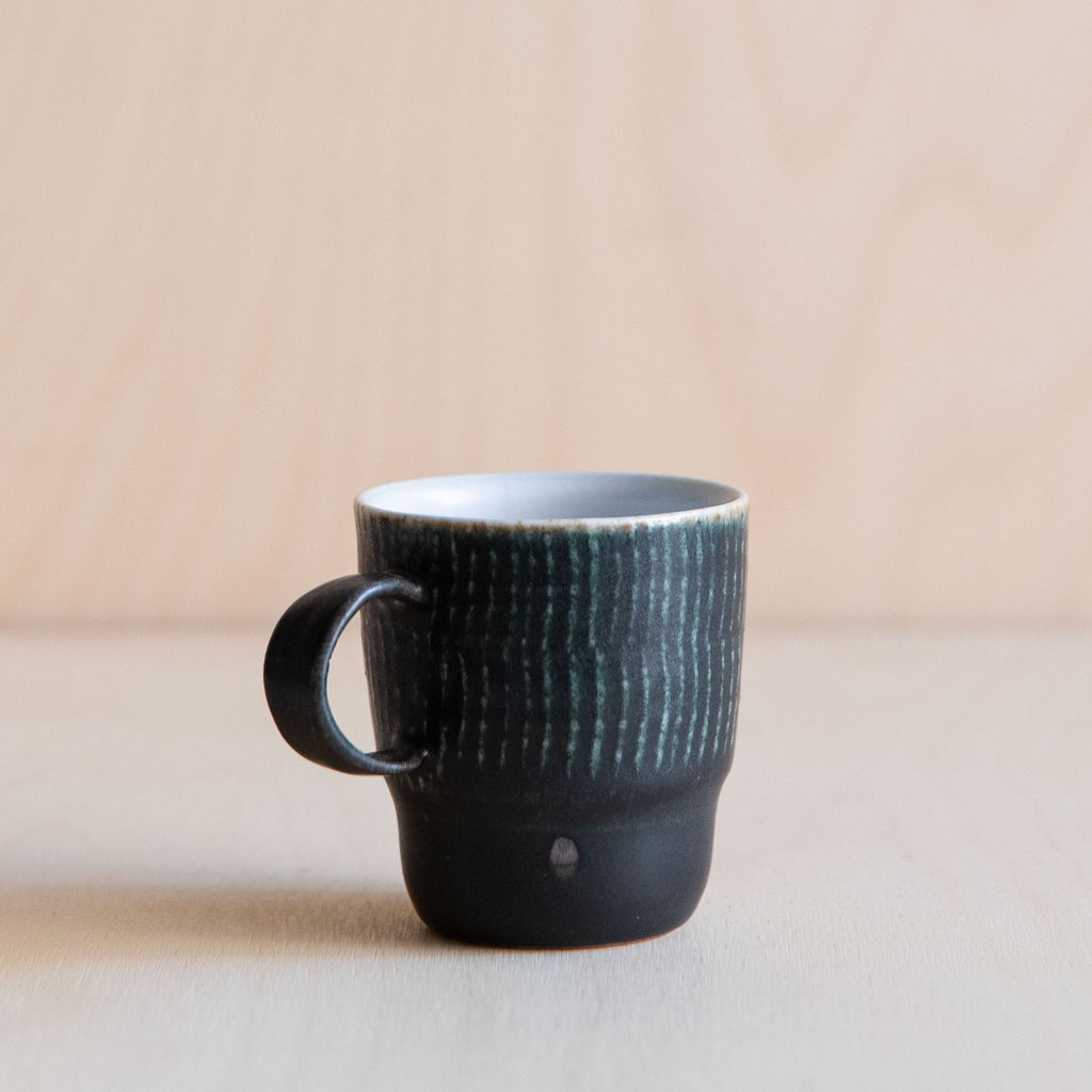 Black Green linear patterned Ceramic Mug 08 by Wang Xinghua