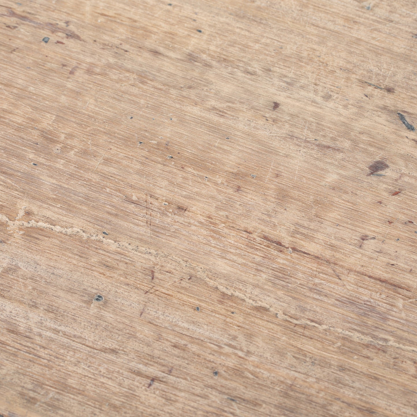 Close-up of Vintage Chinese low elmwood coffee table with natural wood and rustic design.