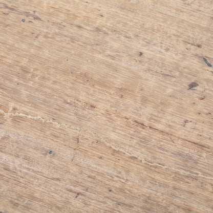Close-up of Vintage Chinese low elmwood coffee table with natural wood and rustic design.