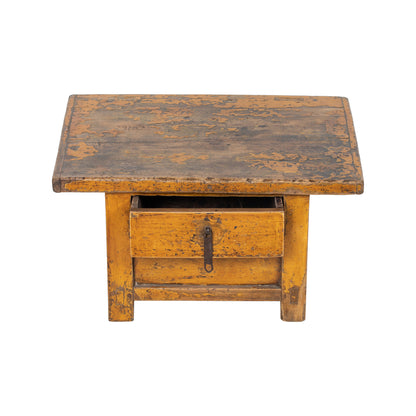 Vintage Chinese Tibetan style wooden kang table with a single drawer in vibrant yellow