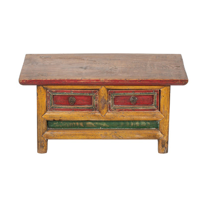 Vintage Chinese Tibetan style kang table with a rustic design and vibrant colours