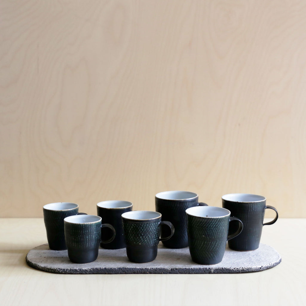 Black Green linear patterned Ceramic Mug 03 by Wang Xinghua
